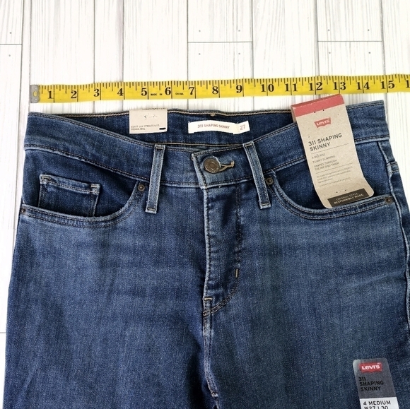 Levi's 311 Mid Rise Shaping Skinny Jean in Medium Wash Blue Size 27 NWT - Picture 5 of 12